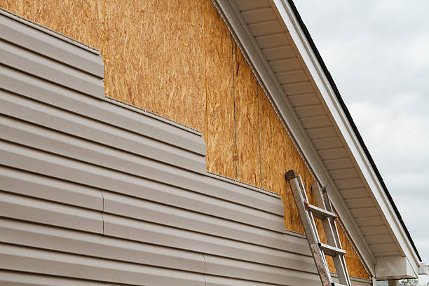 Professional Siding Contractor technician working in Troy, PA